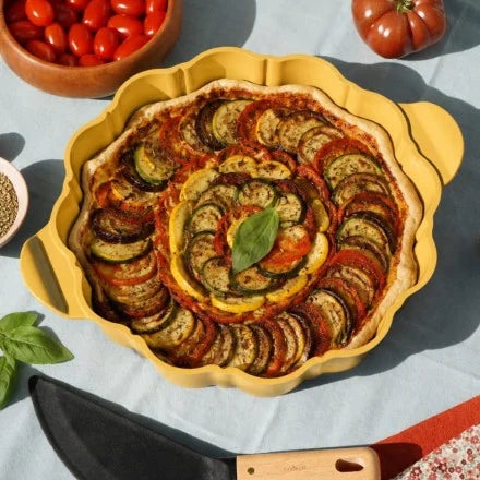 Le formidable plat à tarte avec couteau