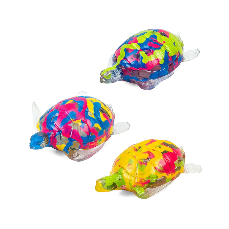 Les jouets sensoriels renferment de vraies taches de peinture colorées en forme de tortue.