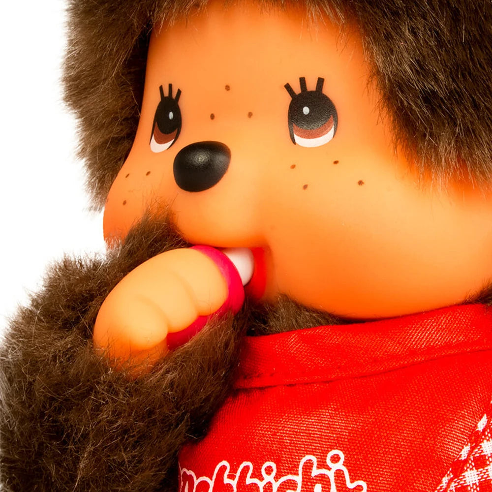 Peluche Monchhichi garçon bavoir rouge