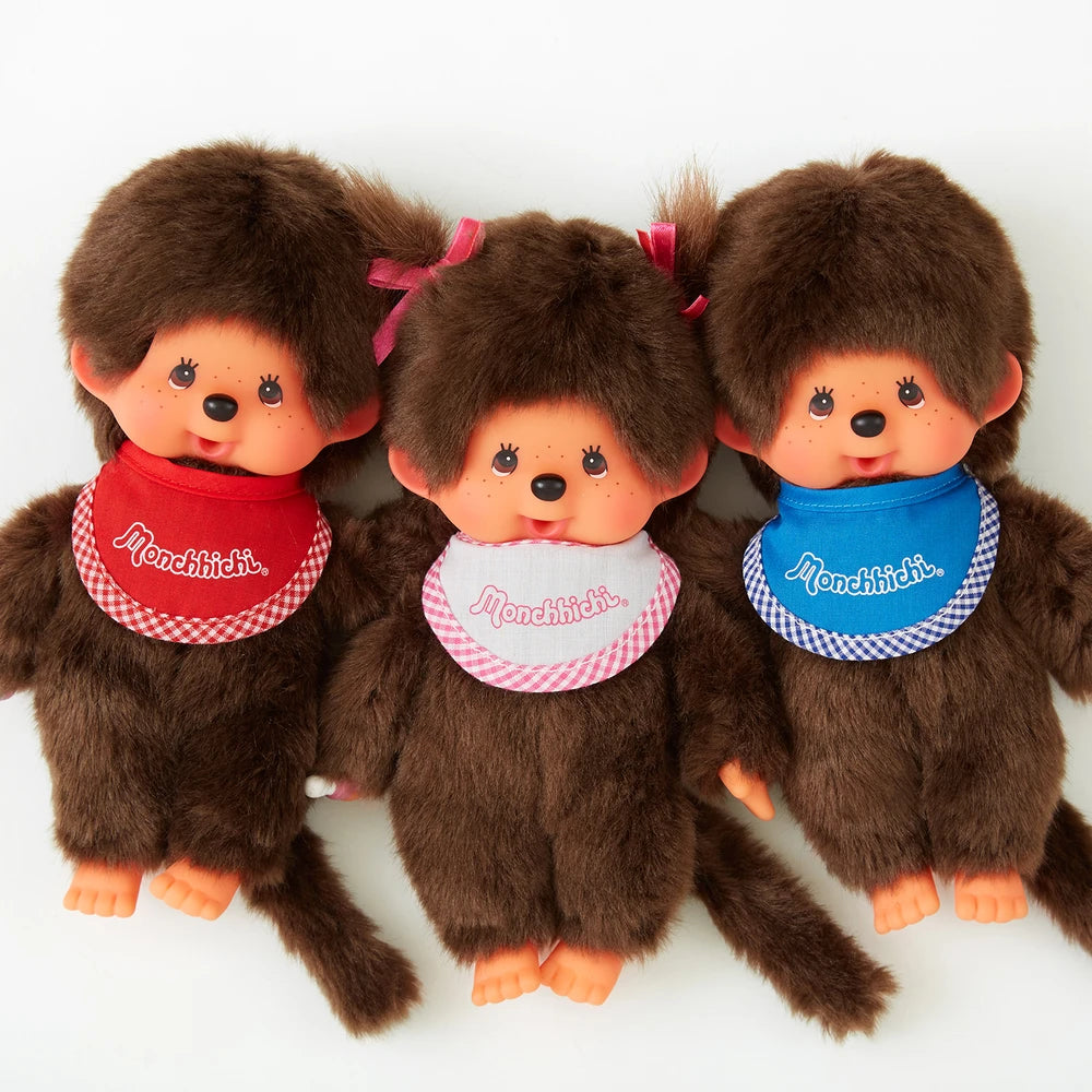 Peluche Monchhichi garçon bavoir rouge